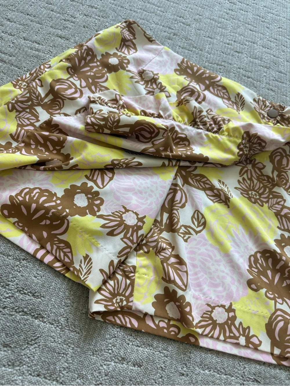 Tory Burch Tory Sport Printed Ruffle Golf Skort in French Crème Bouquet Pink